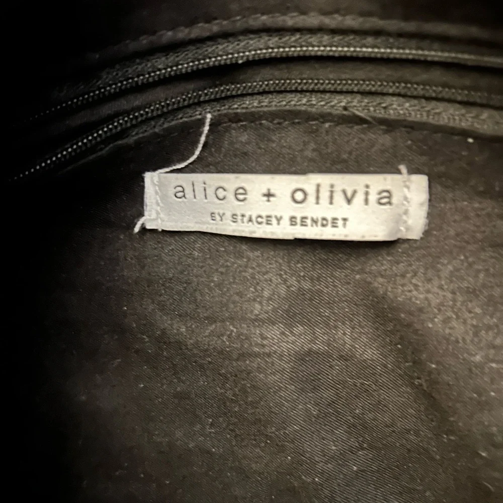 Alice & Olivia black floral canvas duffle bag